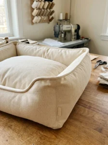 Neat piping and professional stitching on a handmade dog bed